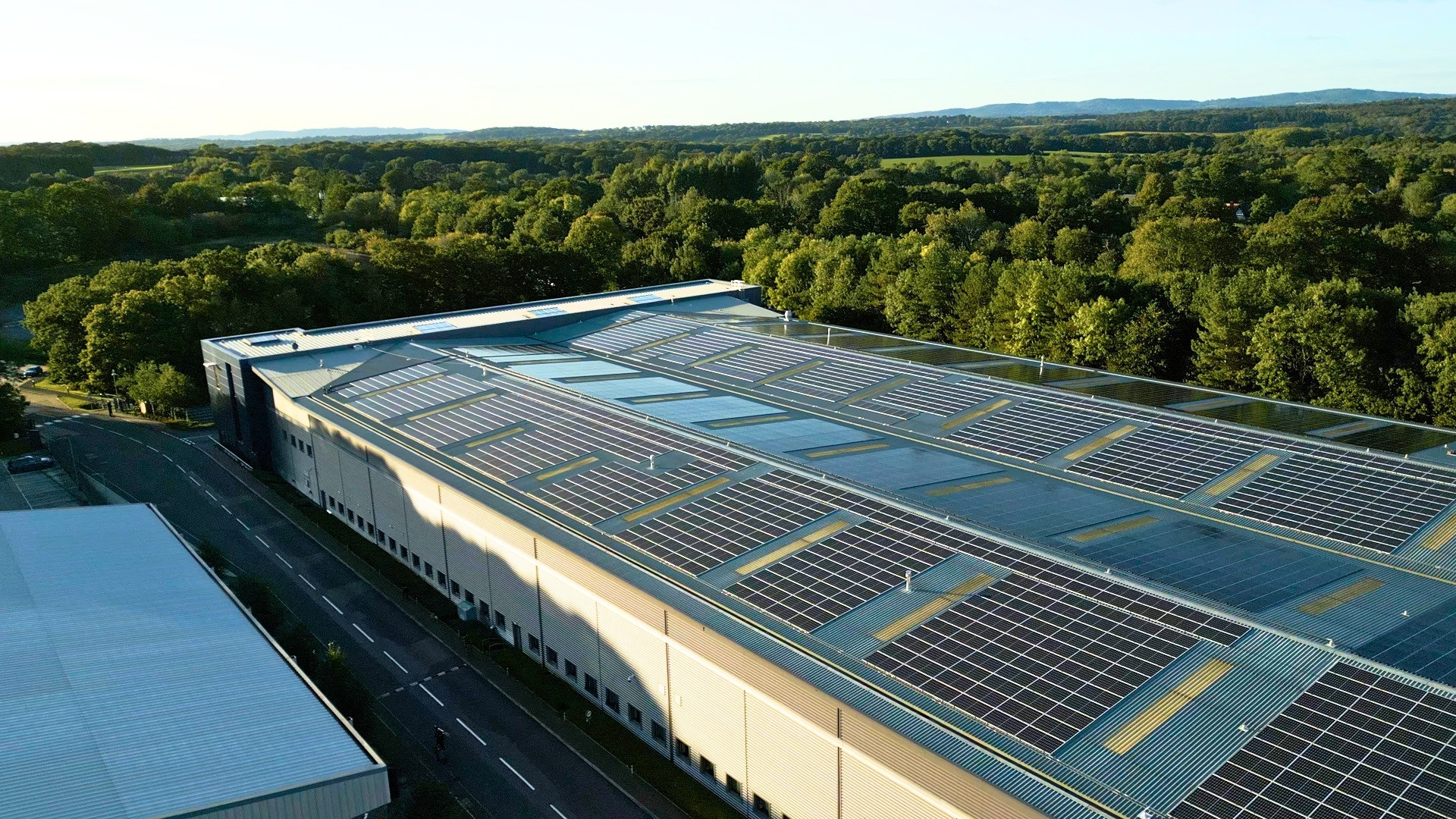 AJW Group headquarters showing vast solar panel array on the roof of the building